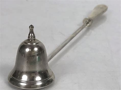 Sterling Silver Candle Snuffer .